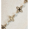 Collar "Santina entre flores"